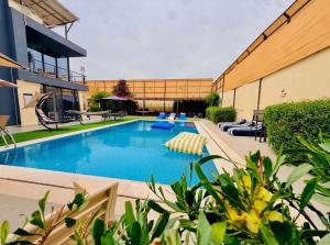 a swimming pool in the middle of a building at Dahab Luxury Villa with Private Pool in Al Rama +3 photos