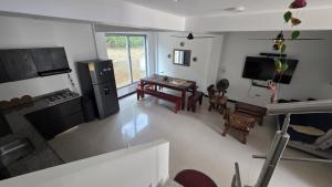 an aerial view of a kitchen and living room at Bambú Alojamiento in Carmen de Apicalá