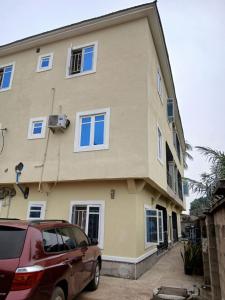a car parked in front of a building at City Homes in Makurdu