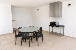 a dining room with a table and chairs at Casa da Tapada - Grupo Casas Vale do Lima in Ponte de Lima