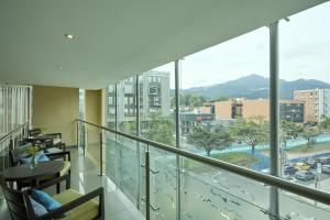 a balcony with a view of a city at Hotel bh Usaquén in Bogotá +27 photos