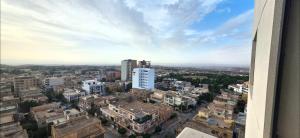 a view of a city from a building at Luxury Apartment in Tlemcen