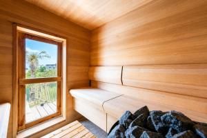 a room with a sauna with a window at IPC Resort富津竹岡 in Futtsu +36 photos
