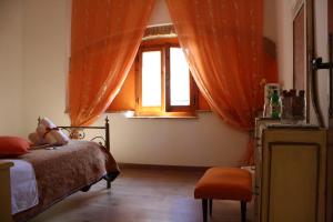 Postel nebo postele na pokoji v ubytování Alla Corte di Carla + 19 fotografií