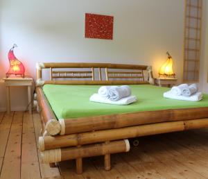 Postel nebo postele na pokoji v ubytování Villa Viriditas