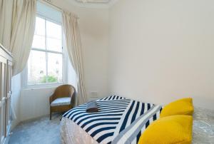 Cama ou camas em um quarto em Dean Terrace Apartment