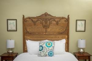 Säng eller sängar i ett rum på Aldrich Guest House