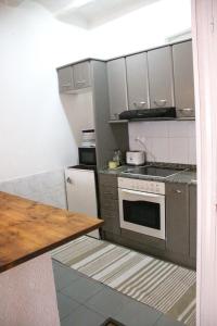 A kitchen or kitchenette at Loft Tarragona Center