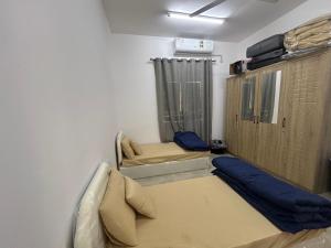 Postel nebo postele na pokoji v ubytování النهظة