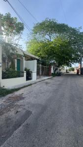 an empty street in front of a house at Bernardino in Valladolid