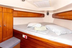 a bed in the back of a boat at Yacht Pipit - Unique Stay in Marina of Kavala in Kavála