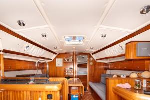 a kitchen and living room in a boat at Yacht Pipit - Unique Stay in Marina of Kavala in Kavála