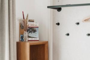 a shelf with a box on it next to a door at Weingut Pugl in Leibnitz +97 photos