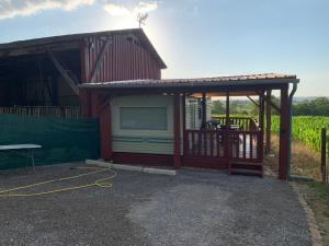 a building with a garage with a roof at Bordagorria 