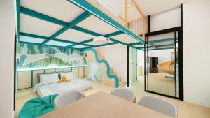 a room with a bed and a table and chairs at Sunway GRID Iskandar Puteri near Legoland by SR Home in Kampong Pendas +287 photos