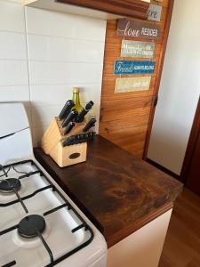 a kitchen counter with a stove and a counter top at Sun, Sand, and Tranquility in Rye in Rye +13 photos