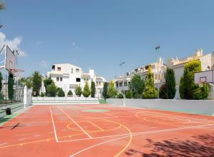 a basketball court in the middle of a city at Casa en la playa con piscinas in Gran Alacant
