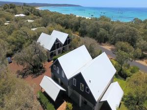 an aerial view of a black house with white roofs at Villa 5 Whitesands in Dunsborough