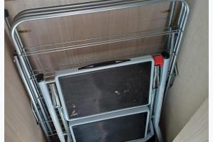 a metal rack with a window in a wall at 3-Bed Caravan Sleeps 7 with Indoor Pool in Wigton