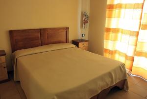 Postel nebo postele na pokoji v ubytování Hotel Fly