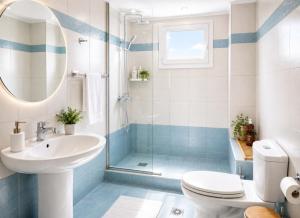 a bathroom with a shower and a sink and a toilet at Boutique lux apartments in Kavála +49 photos