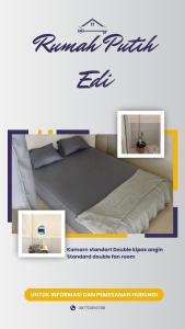 a picture of a bed in a room at Rumah Putih Edi in Sengkol