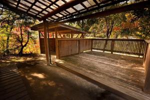 a wooden deck with a wooden pergola at Haecho County - Camp - Vacation STAY 42289v in Oshite