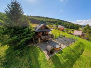 an overhead view of a small building with a playground at Willa VIP in Porąbka