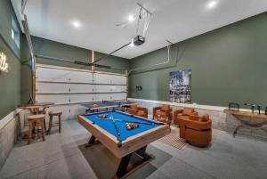 a billiard room with a pool table and chairs at Rooftop Deck & Shuffleboard BBQ Near Downtown in Nashville +46 photos