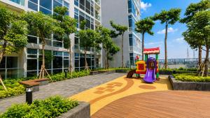 a playground in front of a building at Modern studio with a stûnning view at 32 floor in Jakarta