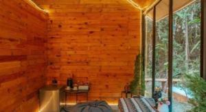 a room with a wooden wall and a window at LOUVREFER in Ban Pa Pae +138 photos