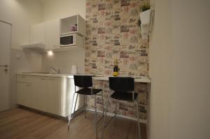 Kuchyňa alebo kuchynka v ubytovaní Downtown Luxury Apartment + 37 fotografií