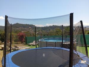 a trampoline and a trampoline at Casa San Son in Pontevedra