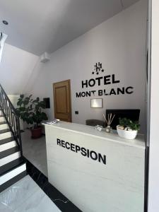 a hotel mount blanc sign on the front of a building at Mont Blanc Hotel in Peshkopi