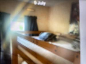 a blurry picture of a bench in a room at D andJ caravan in Winthorpe