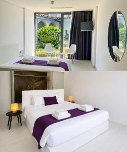 a bedroom with a large white bed and a mirror at Lokàl Boutique Hotel in Larnaca +28 photos