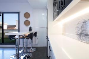 Fotografie z fotogalerie ubytování Apartamento Atico Real Suites v destinaci Granada