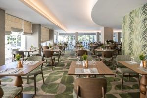 En restaurant eller et spisested på Amalia Hotel Athens