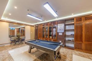 a billiard room with a pool table in it at Maro Luxury Boutique Villa - hotel in Da Thanh
