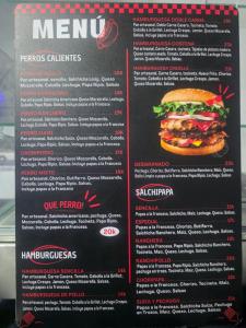a sign for a menu of a hamburger at Hotel Montserrat Luxury in Valledupar