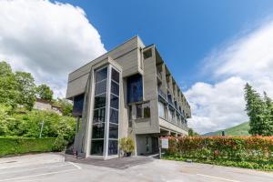 an office building with a large window at Dynamotel in San Marcello Pistoiese