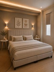 a bedroom with a large bed with two tables at Spitaki mou - 1bd house in Mastihari