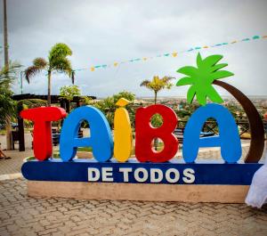 a sign for the beach be tods at Pousada Roane - Taíba in Taíba