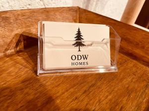 a box with a tree on it sitting on a table at Odw homes - 3Room Apartment for Workers in Weinheim