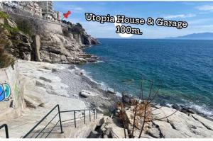 a view of a rocky beach with the ocean at Utopia House & Garage in Kavála +39 photos
