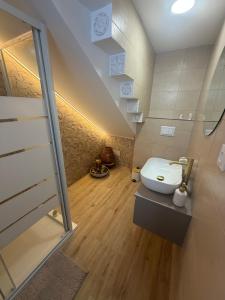 a bathroom with a toilet and a staircase at Casa Boho in Puerto de Mazarrón