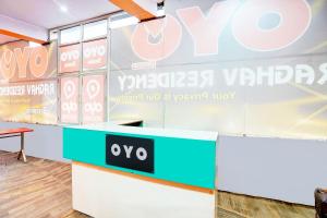a sign for a vodafone store at HOTEL O SUNSHINE in Ghaziabad