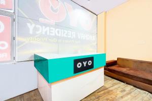 a box with the noo logo on it in a room at HOTEL O SUNSHINE in Ghaziabad
