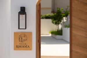 a door with a sign that reads villa rhodoria at Villa Rhodea in Ialysos