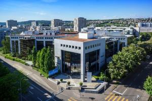 an aerial view of a building in a city at LivingTown Lofts Zurich in Zurich